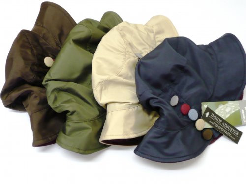 Lds showerproof hat with 5x button detail.